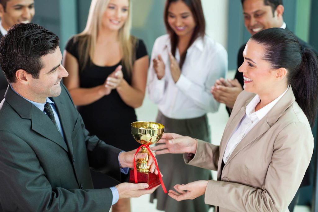 Employee receiving a company award