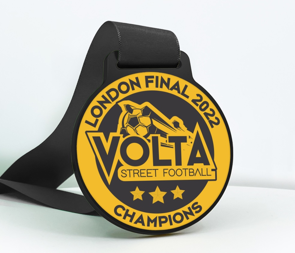 Custom yellow and black football medal for Volta Street Football London Final 2022