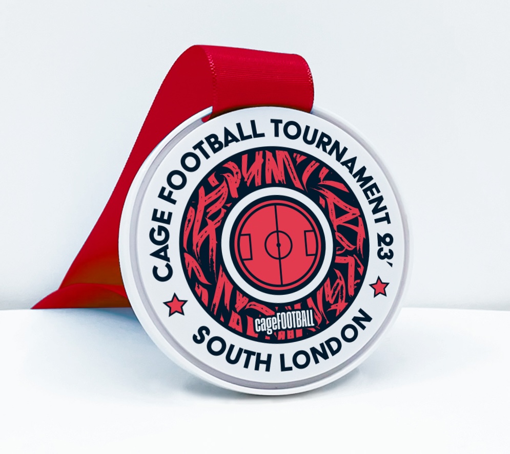 Round football medal for Cage Football 2023 with bold red and navy colours and cage graffiti design.