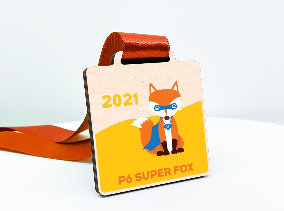 Custom wooden kids medal with cartoon superhero fox and “P6 Super Fox” text, designed for school awards.
