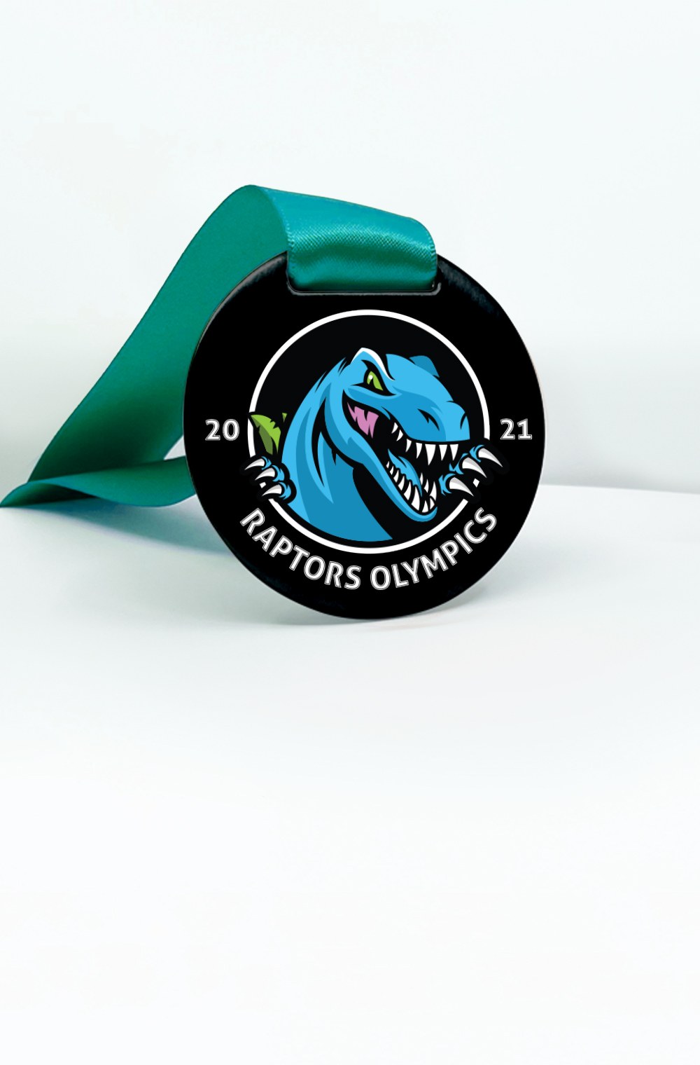 A custom printed school medal on a coloured ribbon